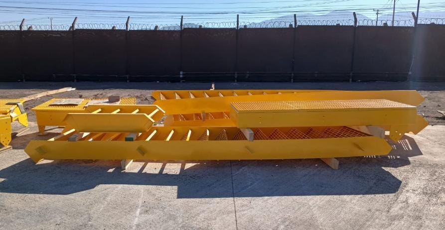 Sections of the helical stairway and perimeter handrails finished and painted
