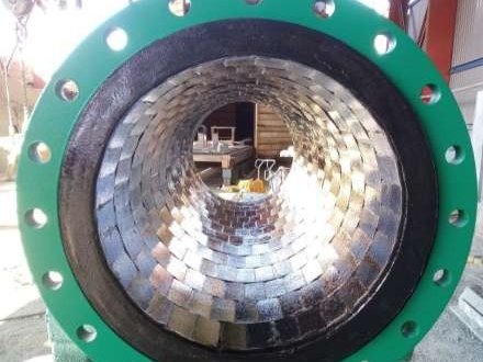 Interior de flange revestido en caucho y cerámica
